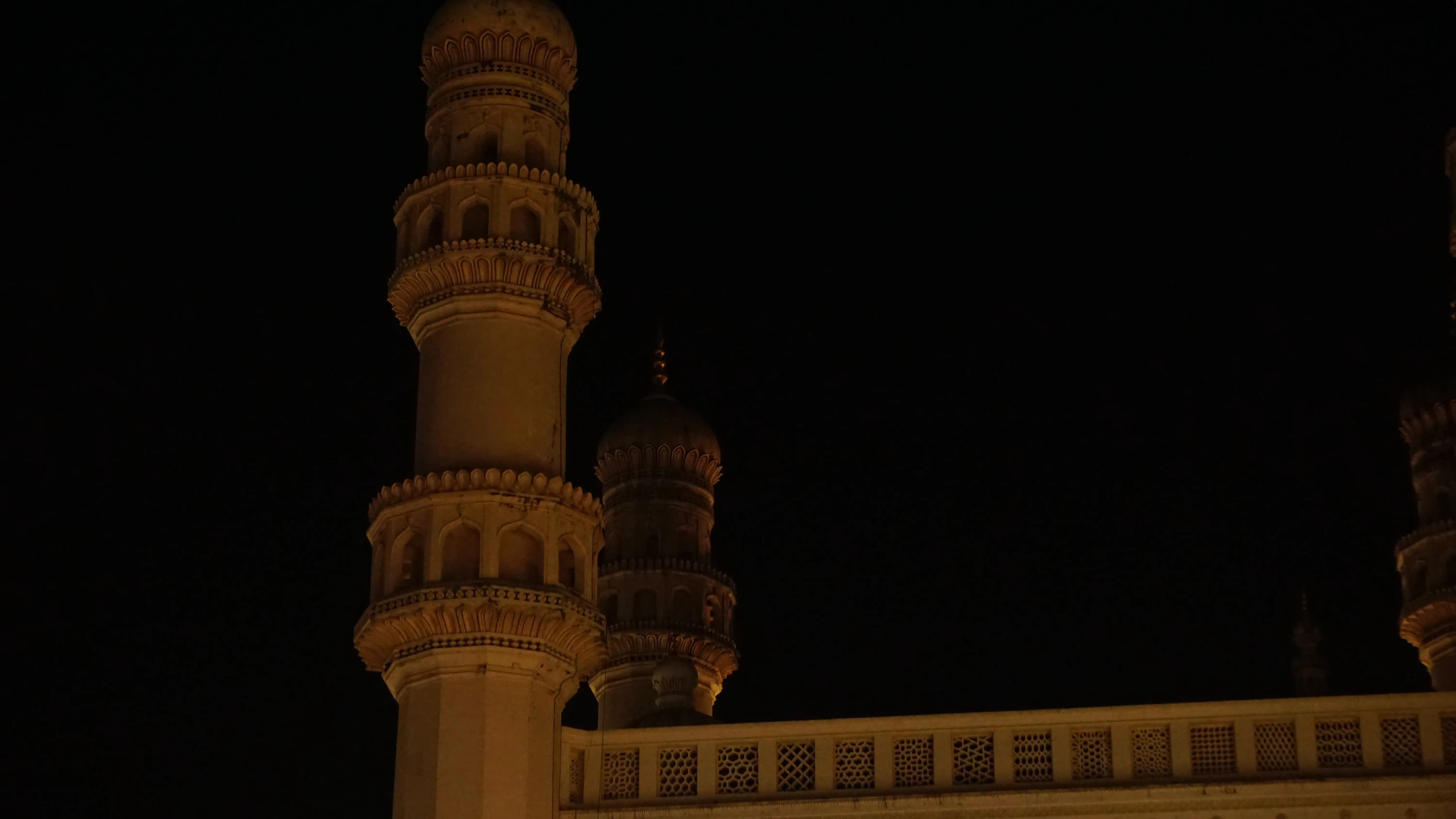 Minarets against a dark sky