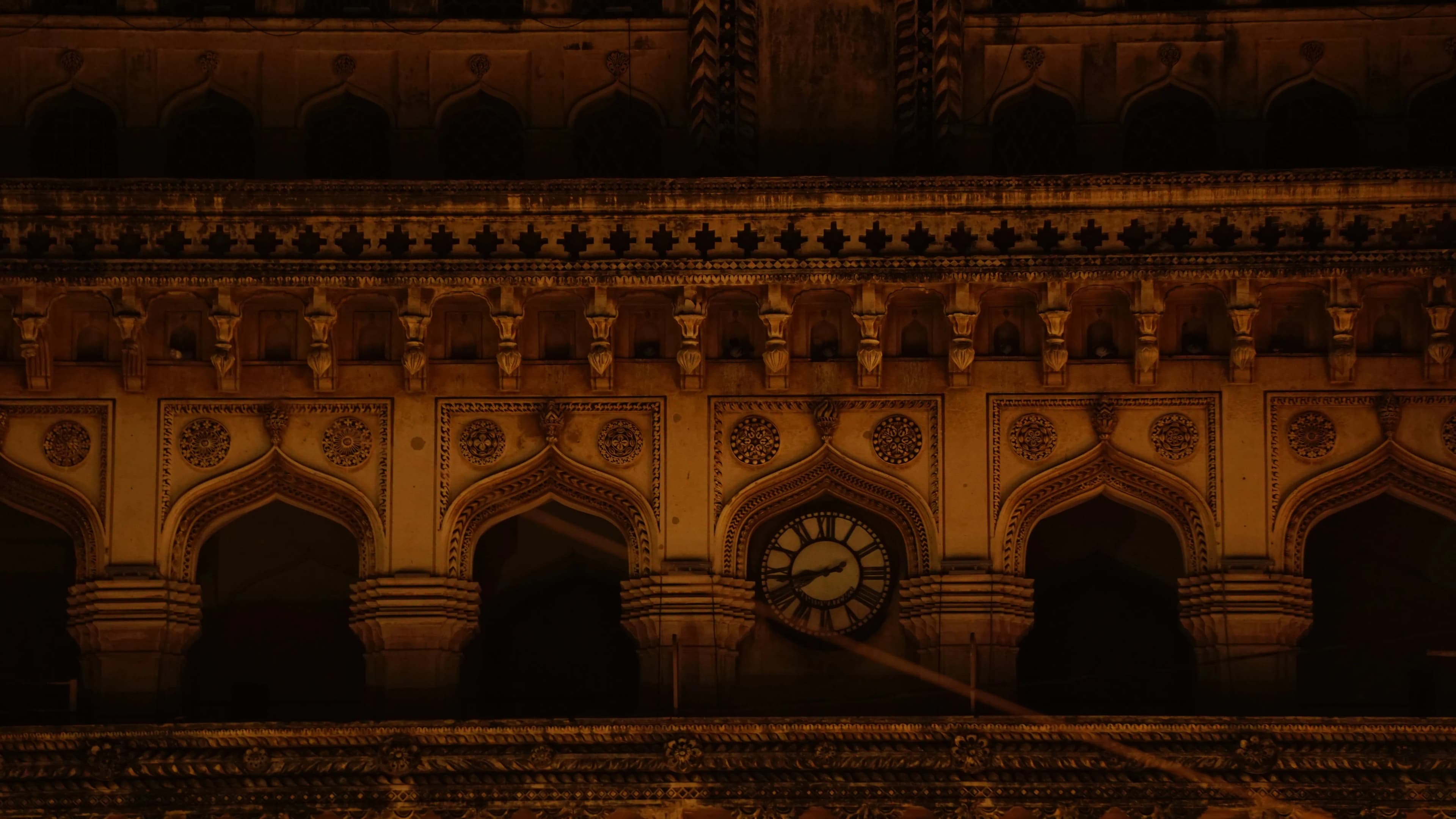 The old clock tower, lit up at night