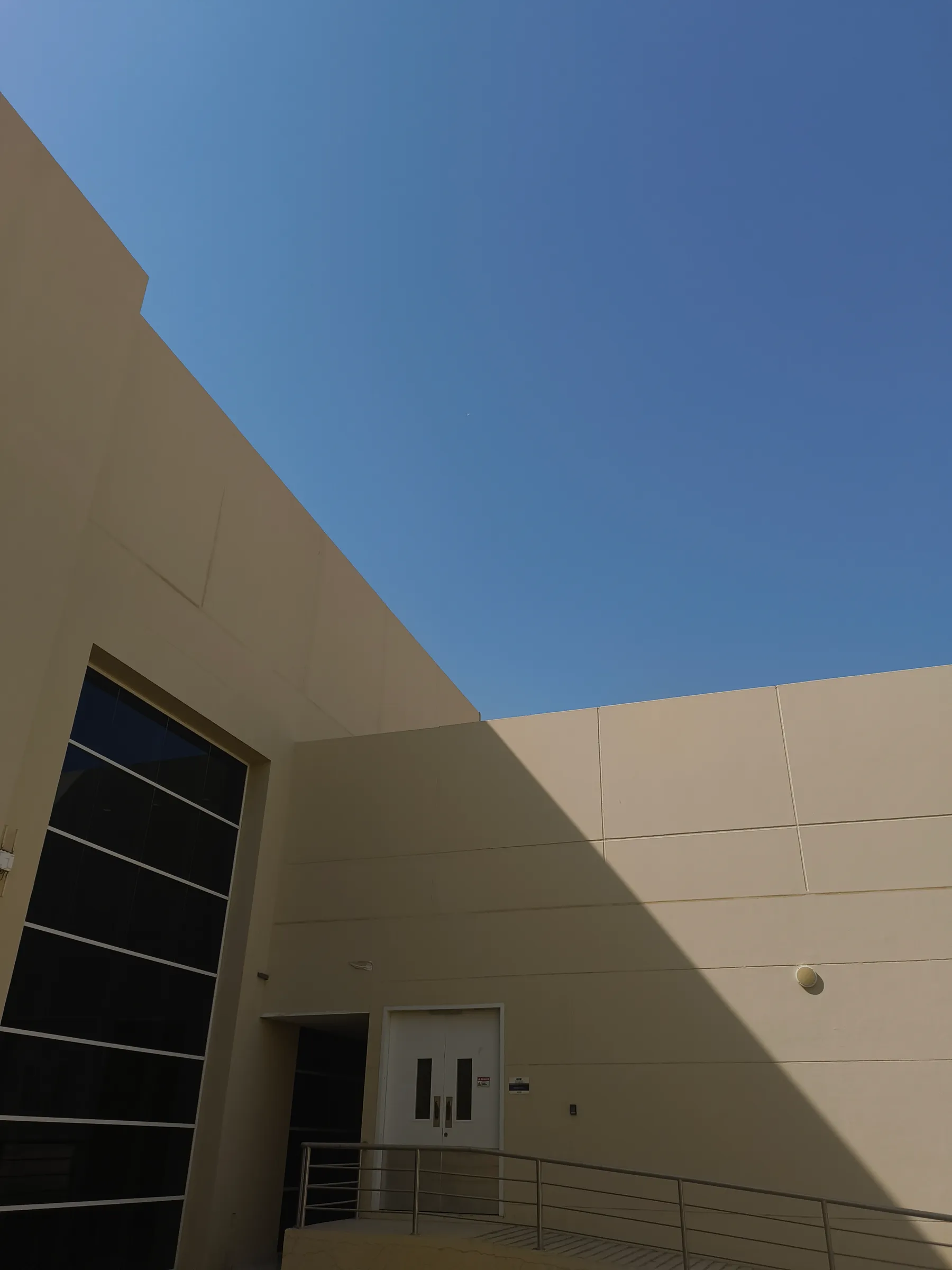 Midday light cutting the building in half