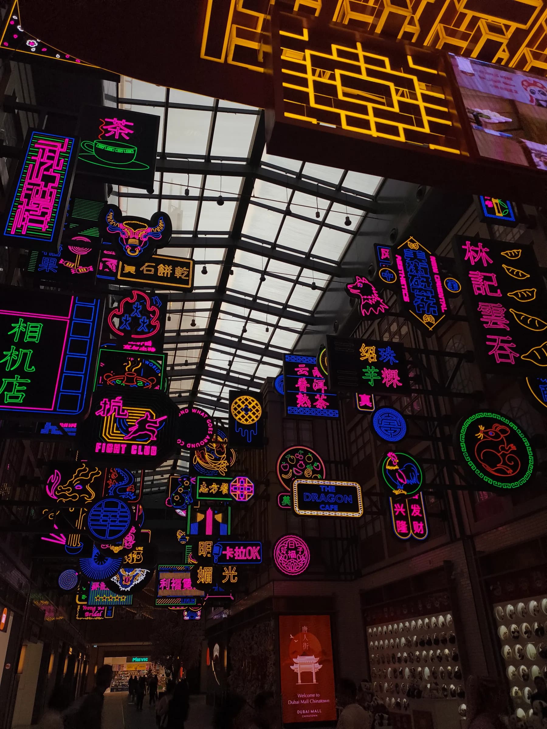 Looking up at the neon in Dubai Mall Chinatown